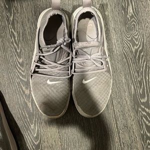 Men’s used gray Nikes size 9.5.